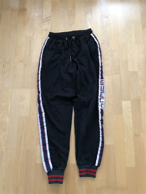 gucci jogginganzug schwarz.